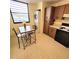 The breakfast nook has a cozy spot to eat, natural light, and washer/dryer at 182 Pineneedle Dr # 182, Bradenton, FL 34210