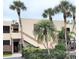 Charming condo complex exterior, nestled among verdant landscaping with scenic, serene appeal and convenient entrances at 182 Pineneedle Dr # 182, Bradenton, FL 34210