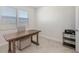 Cozy home office with natural light and classic furnishings at 2015 Bolsena St, Nokomis, FL 34275