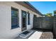 Private back entrance with a modern door and a fenced patio at 2105 Hibiscus St, Sarasota, FL 34239