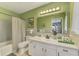 Classic bathroom with vanity, mirror, and tub-shower combination at 2105 Hibiscus St, Sarasota, FL 34239