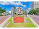 Historic Burns Square featuring a charming building and tropical landscaping in a vibrant downtown setting at 2105 Hibiscus St, Sarasota, FL 34239