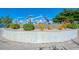 Beautiful dolphin statue fountain in a manicured area, with cityscape in the background on a bright sunny day at 2105 Hibiscus St, Sarasota, FL 34239