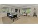 Comfortable living room with dining area, sleek finishes, and a bright, open layout at 2105 Hibiscus St, Sarasota, FL 34239