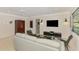 Inviting living room features modern furnishings and a view into another room at 2105 Hibiscus St, Sarasota, FL 34239
