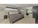 Serene main bedroom with large bed, modern decor, and ample natural light at 2105 Hibiscus St, Sarasota, FL 34239