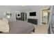 Spacious main bedroom with large bed and view to bath at 2105 Hibiscus St, Sarasota, FL 34239