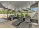Enjoy the spacious screened patio with room for a grill, outdoor furniture and lounging at 2105 Hibiscus St, Sarasota, FL 34239