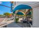 Veronica Cocktails features a blue awning, sidewalk seating, and an inviting storefront at 2105 Hibiscus St, Sarasota, FL 34239