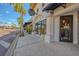 La Papaya Cuisine storefront featuring outdoor seating, lush greenery, and attractive design at 2105 Hibiscus St, Sarasota, FL 34239