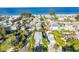 Aerial view of a beach community with the ocean in the background on a sunny day at 2300 Avenue B, Bradenton Beach, FL 34217