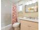 This bathroom has modern fixtures, granite countertops, and a tub with shower at 2300 Avenue B, Bradenton Beach, FL 34217
