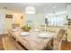 Well-lit dining room features a wooden table and an inviting atmosphere for Gathering meals at 2300 Avenue B, Bradenton Beach, FL 34217
