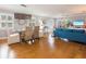 Open living room with dining room and hardwood floors provides ample space to relax and entertain at 2300 Avenue B, Bradenton Beach, FL 34217