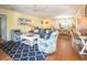 Open-concept living room connects to the dining area, perfect for entertaining guests at 2300 Avenue B, Bradenton Beach, FL 34217