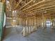 Framed interior view highlighting the open floor plan of the new construction home at 278 Hillshire Pl, Spring Hill, FL 34609