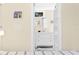 Bright bathroom features a modern vanity, mirror, and open shelving at 2830 Gypsy St, Sarasota, FL 34231