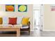 Comfortable living room featuring warm colors and access to the bathroom at 2830 Gypsy St, Sarasota, FL 34231
