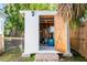 Outdoor shed with an open door, providing easy access to storage space and backyard supplies at 2830 Gypsy St, Sarasota, FL 34231