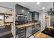 Modern kitchen featuring stainless steel appliances, gray cabinetry, and stylish countertops at 2910 11Th W Ave, Bradenton, FL 34205