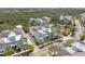 Expansive aerial shot of a beautiful home with a metal roof and a perfectly manicured lawn at 315 Sapphire Lake Dr # 202, Bradenton, FL 34209