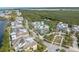 An aerial view of a beautiful property surrounded by mature landscaping and neighboring houses at 315 Sapphire Lake Dr # 202, Bradenton, FL 34209