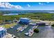 Aerial view of the waterfront community, with marina, hotel, and boat docks along the bay at 315 Sapphire Lake Dr # 202, Bradenton, FL 34209