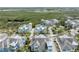 Aerial community view with homes, serene waterways, and lush landscaping at 315 Sapphire Lake Dr # 202, Bradenton, FL 34209