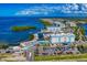 Beautiful aerial of community, marina, and waterfront hotel with recreational amenities and nearby waterways at 315 Sapphire Lake Dr # 202, Bradenton, FL 34209