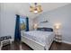 Bright bedroom with a ceiling fan, a window view and white trim at 315 Sapphire Lake Dr # 202, Bradenton, FL 34209