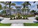 Inviting clubhouse entrance with well-manicured landscaping, creating a welcoming atmosphere for residents and guests at 315 Sapphire Lake Dr # 202, Bradenton, FL 34209