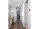 Hallway with beautiful flooring and neutral colored walls and openings to other rooms at 315 Sapphire Lake Dr # 202, Bradenton, FL 34209