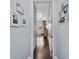 Hallway with white trim and a view to the living space at 315 Sapphire Lake Dr # 202, Bradenton, FL 34209