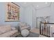 Stairway landing area with seating, coastal decor, and natural light at 315 Sapphire Lake Dr # 202, Bradenton, FL 34209