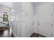 Elegant foyer with wainscoting detail, hardwood floors, and a stylish chandelier at 315 Sapphire Lake Dr # 202, Bradenton, FL 34209