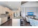Updated kitchen boasts island seating, stainless appliances, and seamless flow to living area at 315 Sapphire Lake Dr # 202, Bradenton, FL 34209