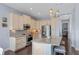 Stylish kitchen with granite countertops, stainless steel appliances, and ample cabinet space at 315 Sapphire Lake Dr # 202, Bradenton, FL 34209
