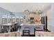 Gourmet kitchen and dining area with granite countertops and stainless steel appliances at 315 Sapphire Lake Dr # 202, Bradenton, FL 34209