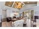 Inviting living room offers hardwood floors, stylish décor, access to the outdoor patio at 315 Sapphire Lake Dr # 202, Bradenton, FL 34209