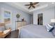 Light and airy main bedroom with beautiful flooring, plantation shutters and ceiling fan at 315 Sapphire Lake Dr # 202, Bradenton, FL 34209