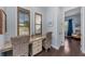 Office area with plantation shutters, desk, and chair at 315 Sapphire Lake Dr # 202, Bradenton, FL 34209