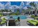Community pool area with plenty of seating, perfect for relaxation and socializing under the sun at 315 Sapphire Lake Dr # 202, Bradenton, FL 34209
