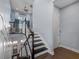 Wooden staircase with white trim and a lift at 315 Sapphire Lake Dr # 202, Bradenton, FL 34209