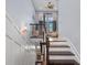 Wooden staircase with white trim leading to living area at 315 Sapphire Lake Dr # 202, Bradenton, FL 34209