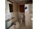 Bathroom with tile and mirror, awaiting renovations and customization to be completed at 3808 118Th W St, Bradenton, FL 34210