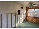 Interior space with ceiling fan, exposed wall studs, and wood paneled wall at 3808 118Th W St, Bradenton, FL 34210