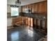 Spacious kitchen with wood cabinets, exposed plumbing, awaiting renovations and customization at 3808 118Th W St, Bradenton, FL 34210
