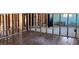 Living space showcasing new hardwood flooring and the open framing of the home at 3808 118Th W St, Bradenton, FL 34210