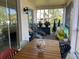 Inviting patio area featuring comfortable seating and kayaks, perfect for outdoor relaxation at 4208 Central Sarasota Pkwy # 1422, Sarasota, FL 34238