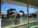 Scenic water view from screened lanai, offering serene outdoor enjoyment at 4208 Central Sarasota Pkwy # 1422, Sarasota, FL 34238
